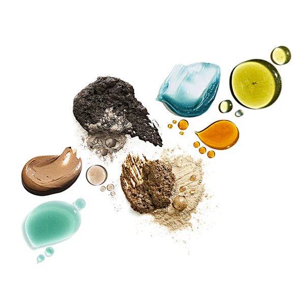 Collection of various May Lindstrom Skin products including cream, powder, and liquid on a white background