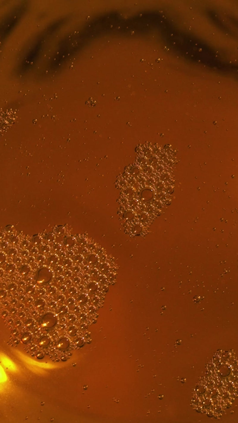 The Youth Dew swirling and being applied to May's face